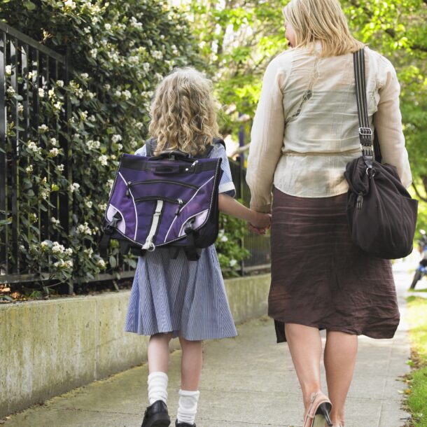 Young person walking to school with parent/carer Young person walking to school with parent/carer